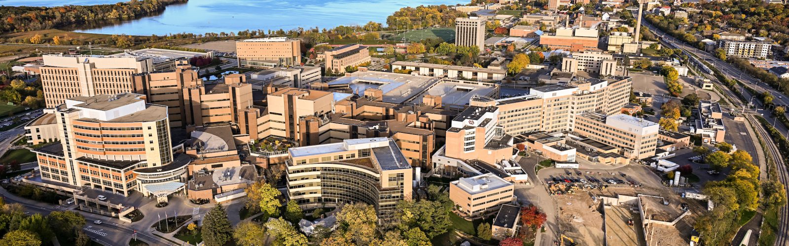 An aerial view snapshot of the UW-Madison campus with Lake Mendota in the background.